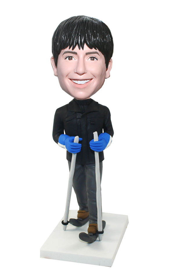 Sport Bobbleheads Male Skiing On Ice With Gloves On Hands-Photo